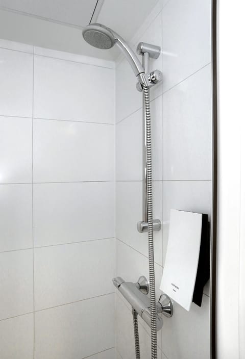 Shower, eco-friendly toiletries, hair dryer, towels