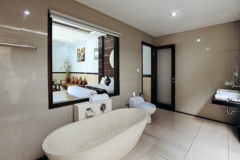 Villa, 1 Bedroom, Private Pool | Bathroom | Combined shower/tub, rainfall showerhead, free toiletries, hair dryer