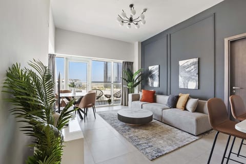 Elite Apartment | Living area | 50-inch Smart TV with digital channels