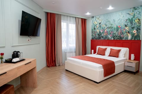 Deluxe Double Room, Courtyard View | In-room safe, blackout drapes, free WiFi