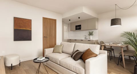 Economy Studio, Garden Area | Living area | 40-inch flat-screen TV with digital channels