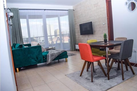 Classic Apartment | Living area | 50-inch Smart TV with cable channels, first-run movies