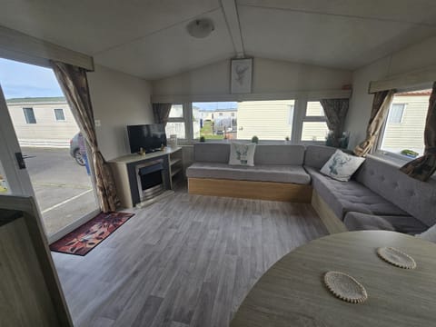 Cabin | Living area | TV, fireplace