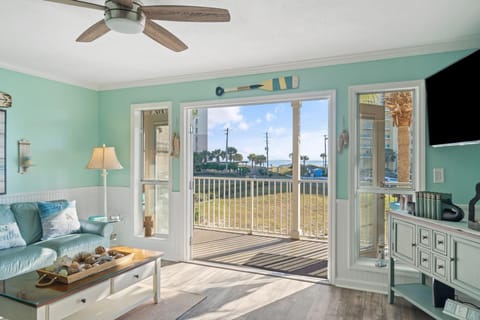 Condo, 1 King Bed with Sofa bed (Grand Caribbean West 215) | Living area | TV