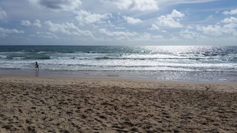On the beach, white sand
