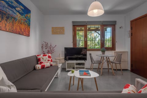 Villa | Living area | Flat-screen TV