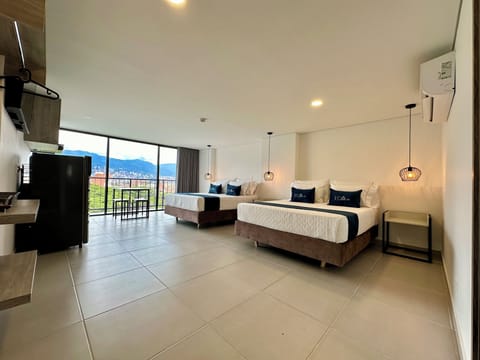 Family Studio, Park View | In-room safe, laptop workspace, blackout drapes, free WiFi