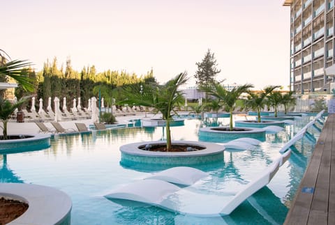 Indoor pool, seasonal outdoor pool, pool umbrellas, sun loungers