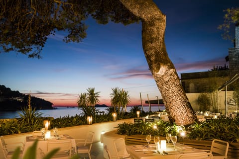 Breakfast, lunch, dinner served; Mediterranean cuisine, beach views