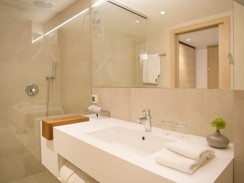 Premium Double Room, Balcony, Sea View | Bathroom | Eco-friendly toiletries, hair dryer, bathrobes, slippers