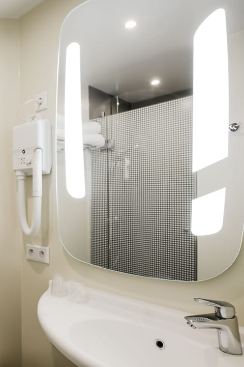 Eco-friendly toiletries, hair dryer, towels