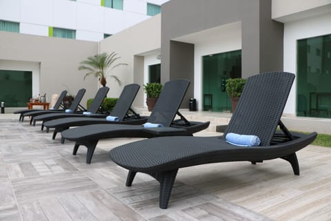 Outdoor pool, pool umbrellas, sun loungers