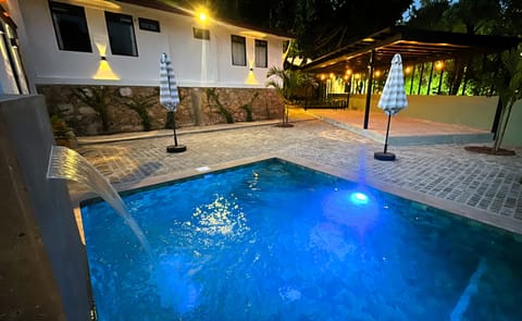 Outdoor pool, open 9:00 AM to 9:00 PM, pool umbrellas, sun loungers