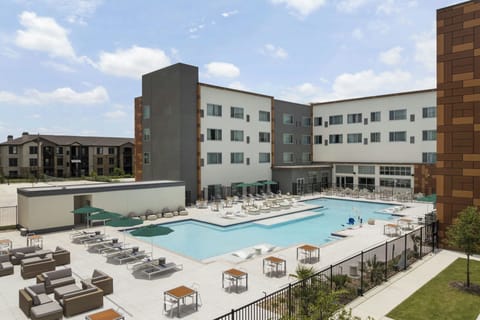 Outdoor pool, open 6:00 AM to 10:00 PM, pool umbrellas, sun loungers