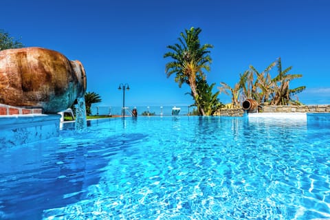 Seasonal outdoor pool, pool umbrellas, sun loungers