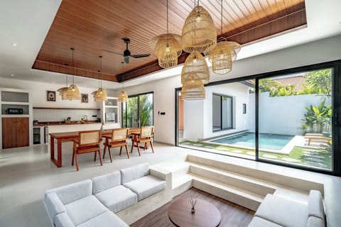 Exclusive Villa, Patio, Pool View | Living area | 60-inch Smart TV with digital channels