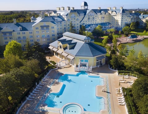 Indoor pool, outdoor pool, open 7 AM to 10 PM, sun loungers