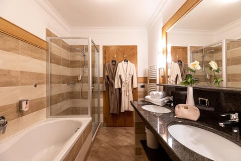 Family Suite, 2 Bedrooms | Bathroom | Hair dryer, bathrobes, towels, soap