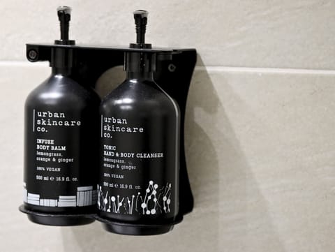 Shower, rainfall showerhead, hair dryer, towels