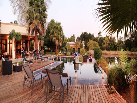 Outdoor pool, open 6:30 AM to 7:00 PM, pool umbrellas, sun loungers