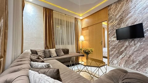 Family Apartment | Living area | 42-inch Smart TV with digital channels, streaming services