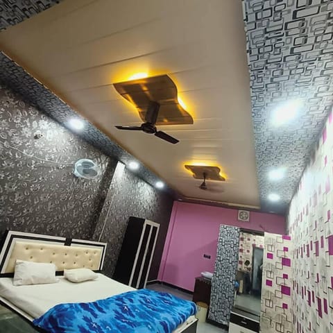 Deluxe Room, Balcony, City View | Desk, bed sheets