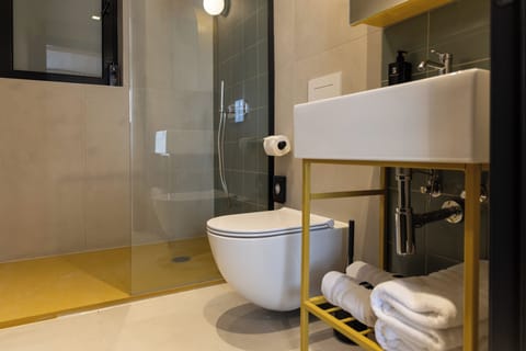 Double Room, Balcony, City View | Bathroom | Shower, bathrobes, slippers, towels