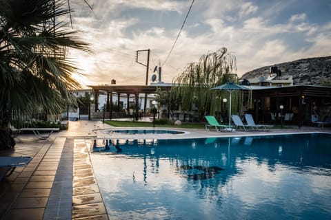 2 outdoor pools, pool umbrellas, sun loungers
