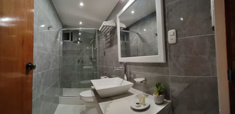 Comfort Room | Bathroom | Shower, towels, soap, shampoo