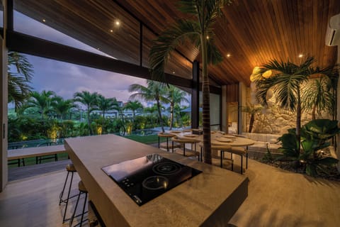 Deluxe Villa, Pool View | Private kitchen | Fridge, microwave, stovetop, coffee/tea maker