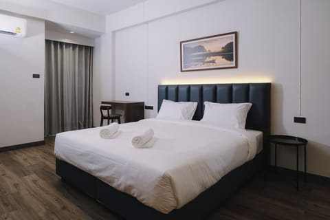 Family Quadruple Room | Free minibar, in-room safe, desk, laptop workspace