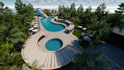 Indoor pool, outdoor pool, pool umbrellas, sun loungers