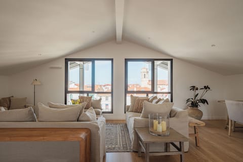 Apartment | Living area | 130-cm Smart TV with digital channels, books