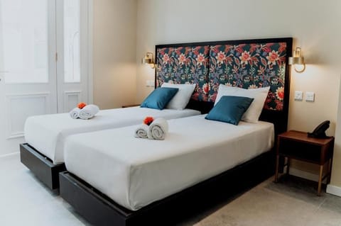 Standard Double or Twin Room, City View | In-room safe, desk, laptop workspace, soundproofing