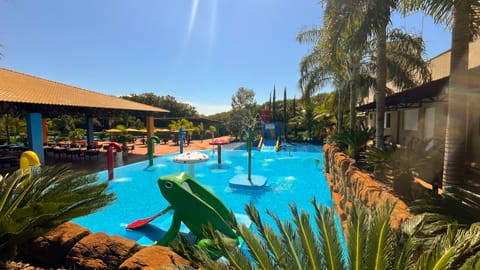 5 outdoor pools, open 10:00 AM to 6:00 PM, pool umbrellas, sun loungers