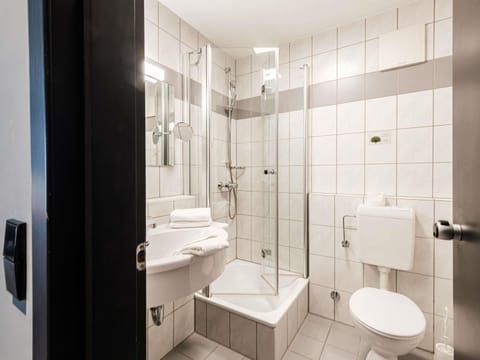 Shower, eco-friendly toiletries, hair dryer, towels