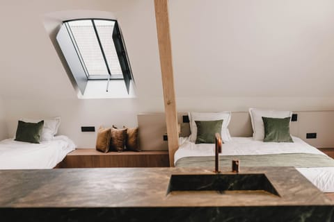 Deluxe Triple Room, Garden View | Soundproofing, free WiFi