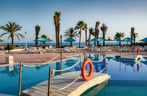 3 outdoor pools, open 9:00 AM to 6:00 PM, pool umbrellas, sun loungers