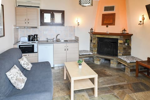 Junior Suite, Sea View | Living area | 45-inch flat-screen TV with cable channels