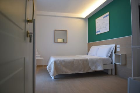Tripla Deluxe Con Balcone | In-room safe, free WiFi, bed sheets