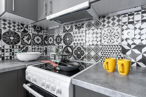 Family Triple Room, Balcony | Private kitchen