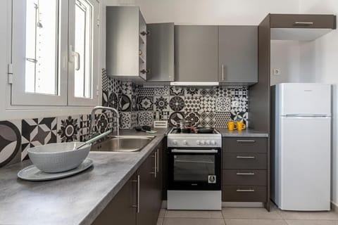 Family Triple Room, Balcony | Private kitchen