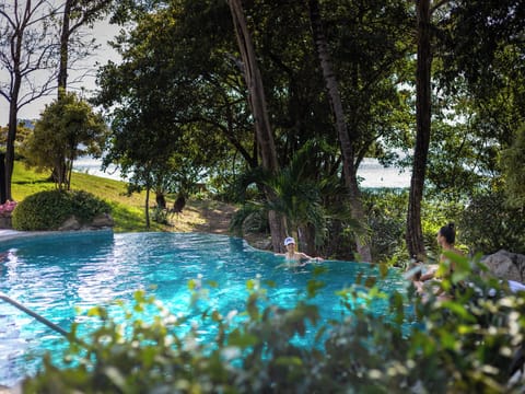 Outdoor pool, pool umbrellas, sun loungers