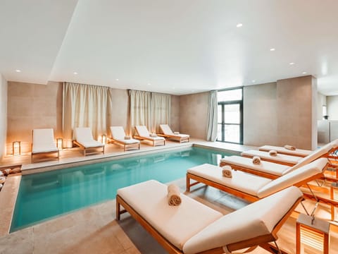 Seasonal outdoor pool, cabanas (surcharge), pool umbrellas