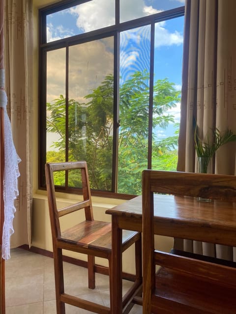 Economy Double Room, Garden View | Desk, laptop workspace, free WiFi