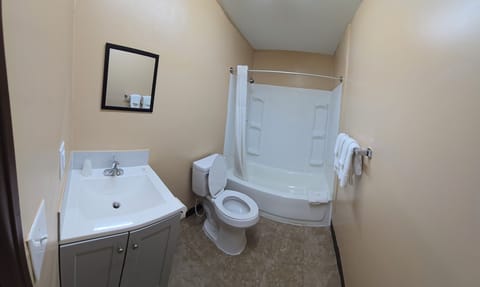 Family Double Room, City View | Bathroom | Combined shower/tub, towels, soap, toilet paper