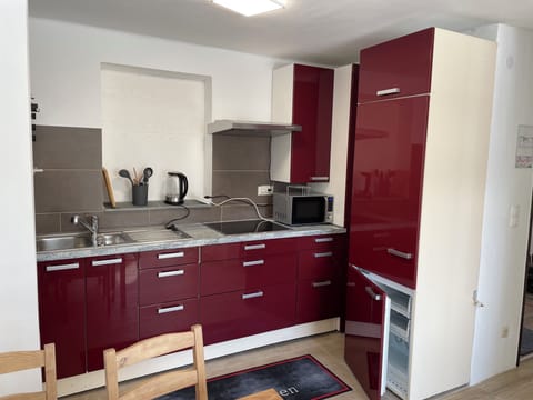 Skiers Apartment | Private kitchen | Highchair