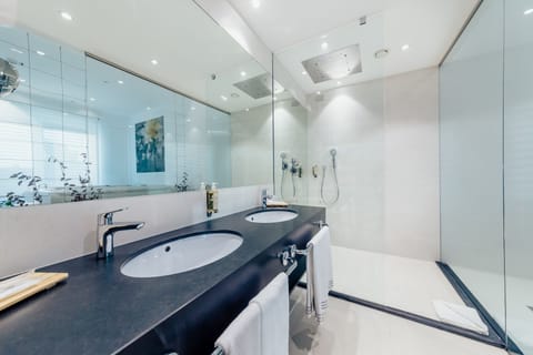 Luxury Studio Suite, 1 King Bed (Direct access) | Bathroom | Shower, free toiletries, hair dryer, bidet