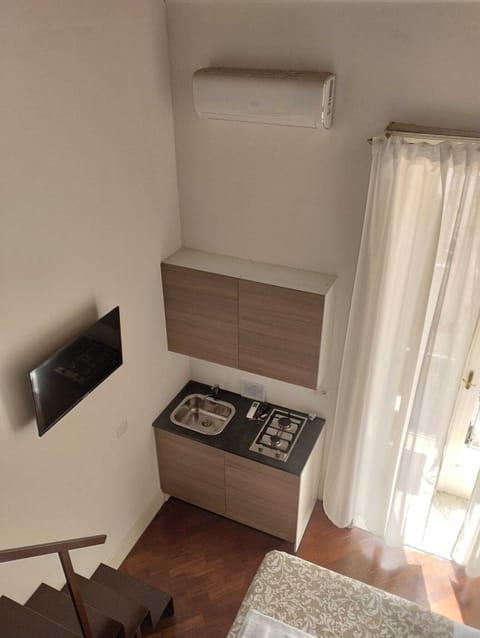 Classic Duplex, Balcony, City View | Iron/ironing board, free WiFi