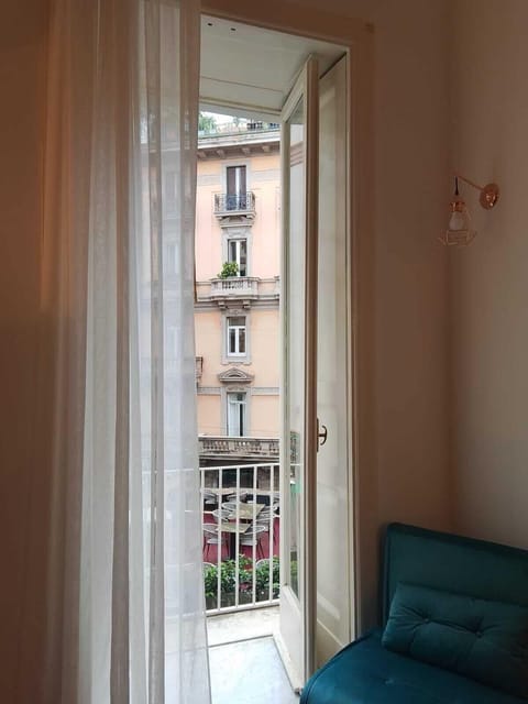Studio Suite, Balcony, City View | Iron/ironing board, free WiFi